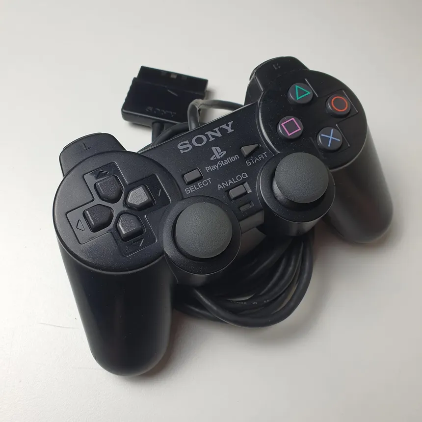 PlayStation DualShock Controller (Complete with Cable)